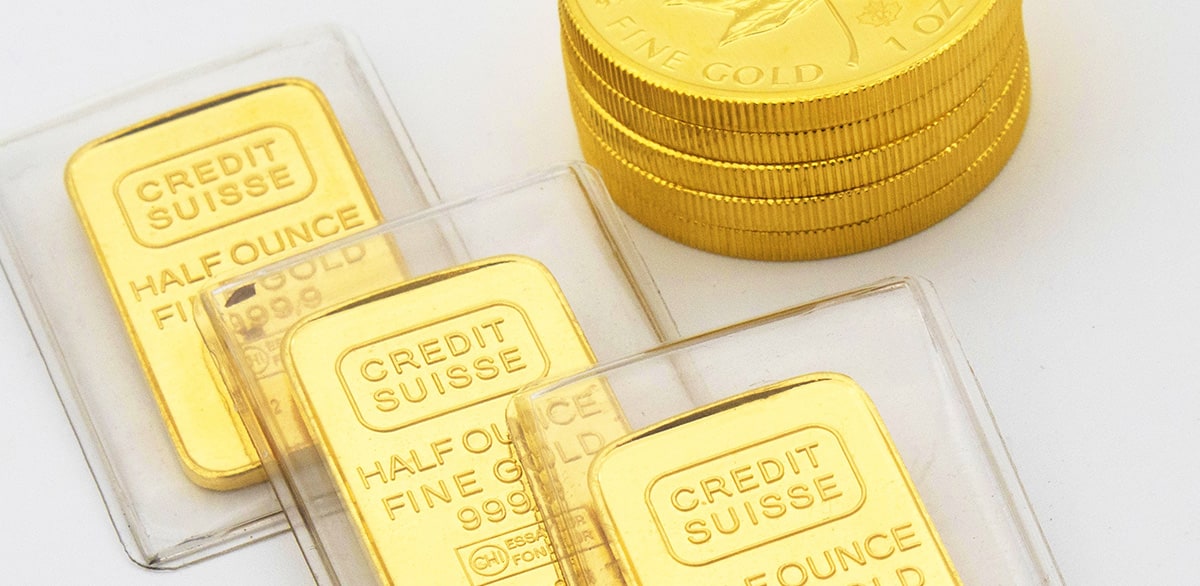 gold bars and coins in troy ounces